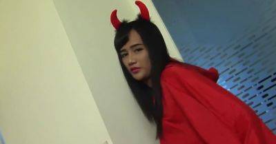 Brunette Ladyboy with Devils Horns Rides a Fat Cock on the Sofa - hotmovs.com