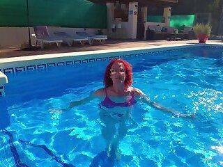 Teasing in the pool - ashemaletube.com