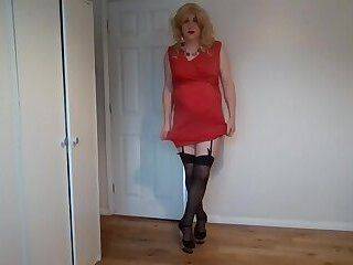 Blonde in red dress and black stockings with no panties on - ashemaletube.com