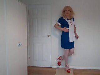 Blonde in nurse uniform and white stockings - ashemaletube.com